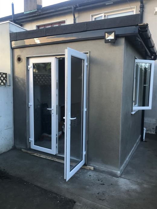 Garden room extension with white patio doors