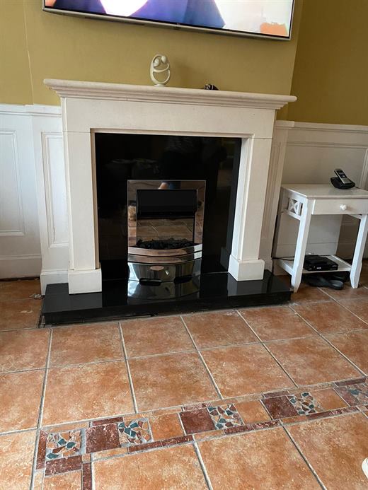 Living room fireplace with tiled hearth