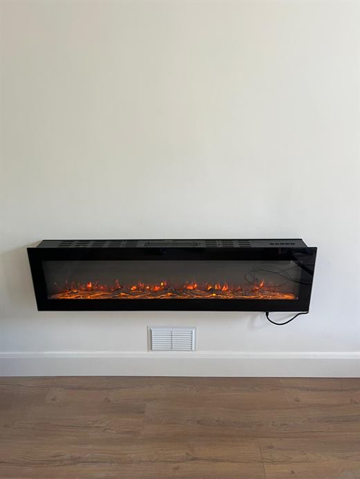 Wall-mounted electric fire above laminate flooring